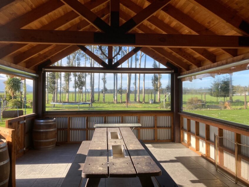 Conservatory shed with outdoor blinds